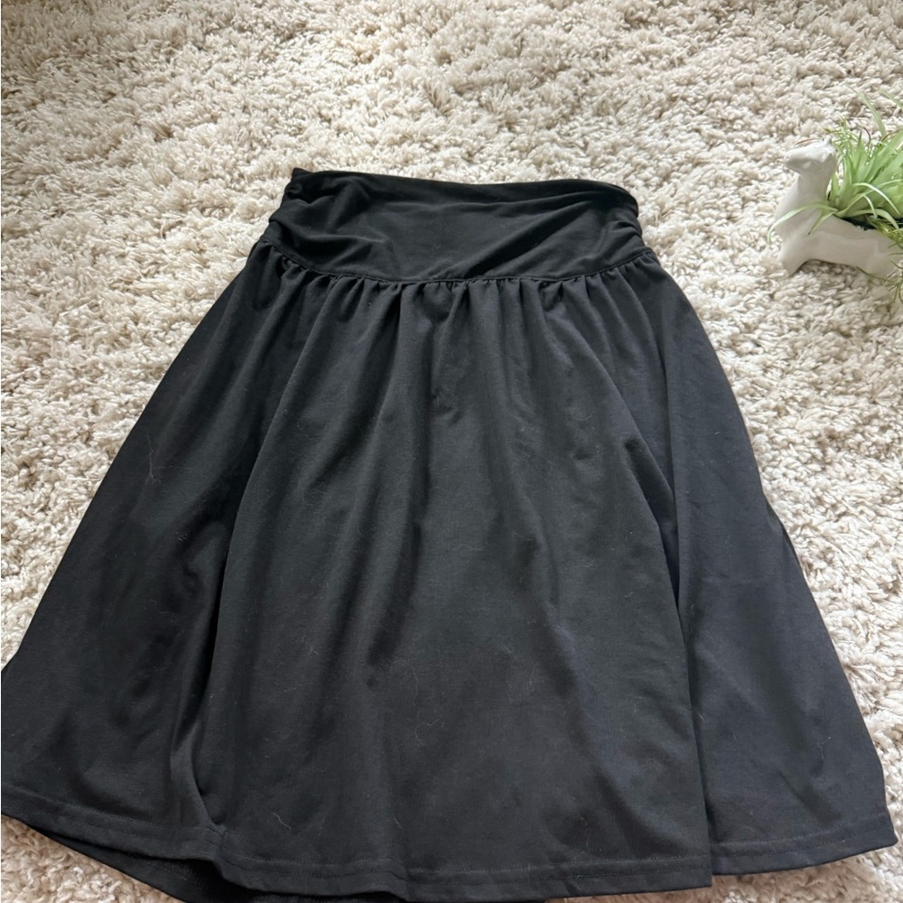 Emery Rose flowy Black mini skirt with a touch of whimsy
Size medium